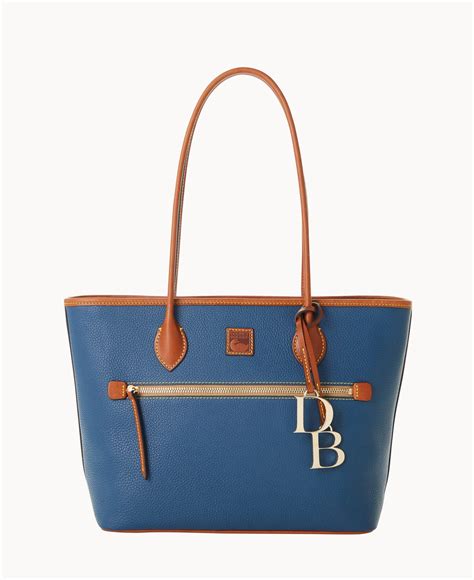 is dooney and bourke better than coach
